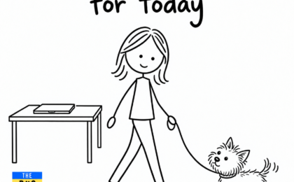 You’ve done enough for today: a professional leaves her laptop to walk her Yorkie, with The Dog Code book in the corner
